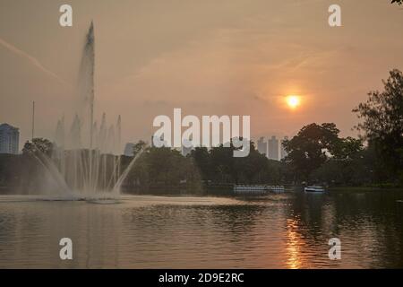 Bangkok, Thailand, March 2106. View of Lumpini Park Lake at sunset. Stock Photo