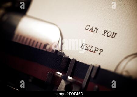 Can you help question phrase written with a typewriter. Stock Photo
