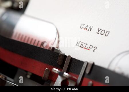 Can you help question phrase written with a typewriter. Stock Photo
