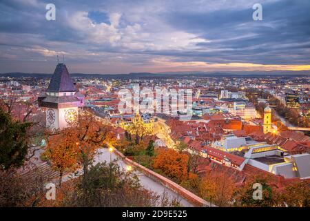 Graz, Austria. Cityscape image of the Graz, Austria with the Clock Tower at beautiful autumn sunset. Stock Photo