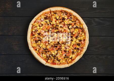 Top view of pizza with beef minced meat, tomato, onion and cheddar Stock Photo
