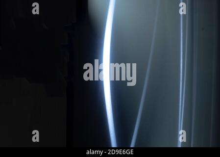 High-tech backgrounds. Reflection of light on a metal surface. Optical pattern on metal. Web. Computer effects. Stock Photo