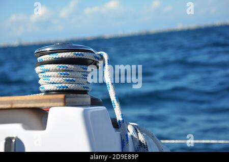 Close-up of a winch with rope on a sailing boat. Stock Photo