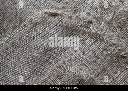 Texture of crumpled natural burlap close-up. Stock Photo