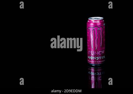 London, United Kingdom, 14th October 2020:- A can of Monster MIXXD Energy Drink Isolated on a black background Stock Photo