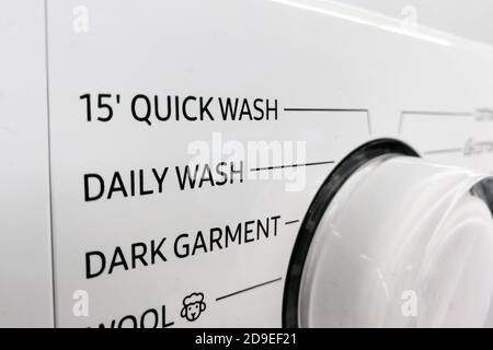 Focus on Quick Wash of washing machine program control dial Stock Photo