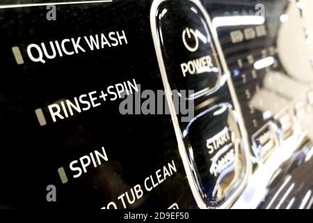 Focus on Quick Wash of washing machine program control dial Stock Photo