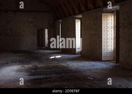 Beautiful hall with three windows in an abandoned palace Stock Photo