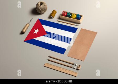 Cuba calligraphy concept, accessories and tools for beautiful handwriting, pencils, pens, ink, brush, craft paper and cardboard crafting on wooden tab Stock Photo