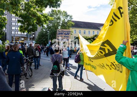 Gottingen, Germany. Autumn 2020. Fridays for future. Protesters holding up signs and banners at anti climate change demonstration. Stock Photo