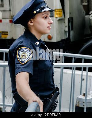 NYC Police woman on duty during New York City Marathon in Central Park ...