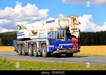 Faun ATF 220 G-5 mobile crane of Supernostot Oy at speed on Highway 2. Jokioinen, Finland. August 28, 2020. Stock Photo