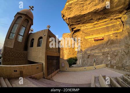 The Zabbaleen (meaning literally garbage people) village at the base of the Mokattam cliffs began around 1969 when the Cairo governor decided to move Stock Photo