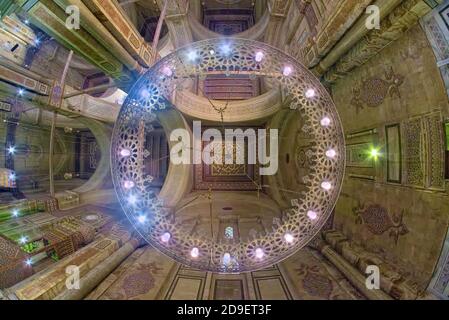 Lighting has always been an interesting element of mosque design. The lighting of this mosque is well suited, consisting mainly of huge, ornate brass Stock Photo