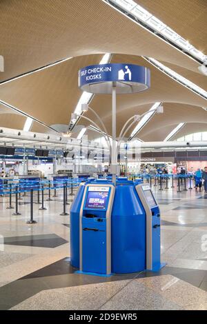 KUALA LUMPUR, MALAYSIA, November 3, 2018: Flight self service check-in kiosk machine at KLIA Airport Stock Photo