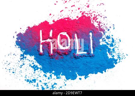 Abstract colorful Happy Holi background. Color vibrant powder isolated on white. Dust colored splash texture. Flat lay holi paint decoration
