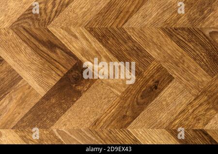 Parquet herringbone chevron wood background floor texture Stock Photo