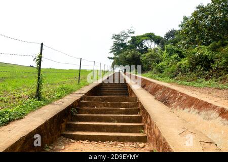 Long steps leading to the top of Banasura sagar dam in Western Ghats,Wayanad, Kerala, long shot Stock Photo