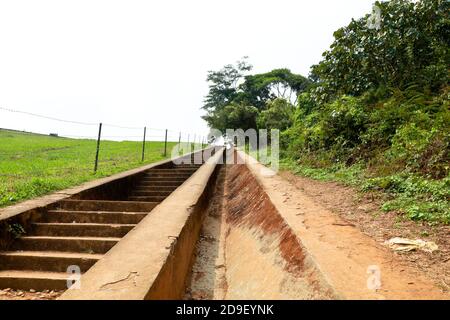 Long steps leading to the top of Banasura sagar dam in Western Ghats,Wayanad, Kerala, long shot Stock Photo