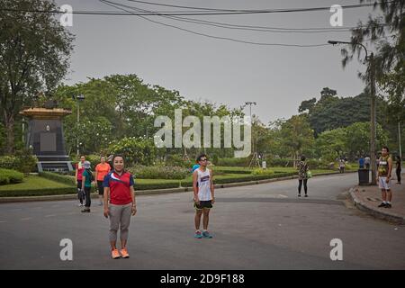 Bangkok Thailand March 2016. People stop at Lumpini Park at