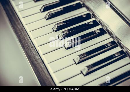 Old piano keys close up. Vintage photo Stock Photo