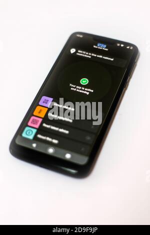 The NHS (National Health Service) 'Test and Trace' Covid-19 app is shown on a mobile telephone during the second UK national lockdown, November 2020. Stock Photo
