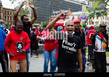 Protesters chanting slogans and making gestures during the demonstration.Members of Economic Freedom Fighters (EFF) take part in a labour march to the Department of Labour and SASSA offices targeting employers who have not paid their employees under the claims of the COVID-19 Temporary Employer-Employee Relief Scheme (TERS). Stock Photo