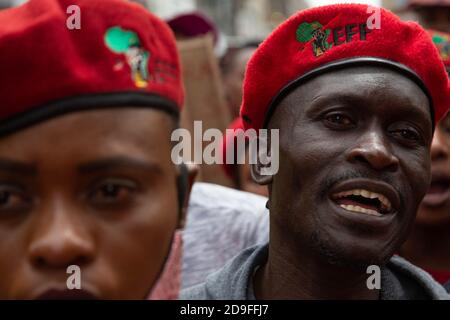 A protester shouting slogans during the demonstration.Members of Economic Freedom Fighters (EFF) take part in a labour march to the Department of Labour and SASSA offices targeting employers who have not paid their employees under the claims of the COVID-19 Temporary Employer-Employee Relief Scheme (TERS). Stock Photo