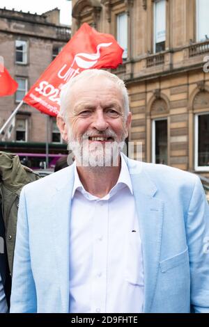 Jeremy Corbyn smiling as he arrives at George Square, Glasgow to speak at the 'Stop the coup defend democracy protest' on 31 August 2019 Stock Photo