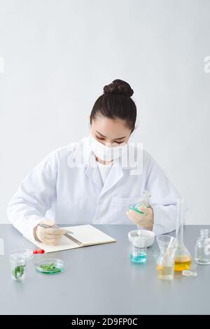 the scientist, dermatologist formulate organic natural cosmetic product in the laboratory Stock Photo