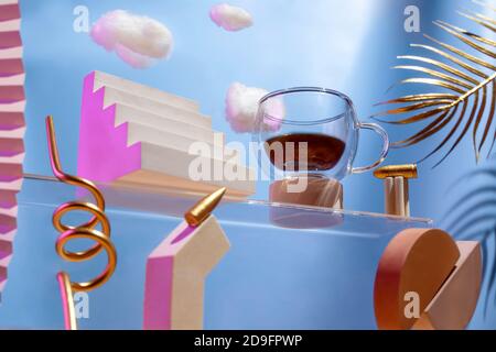 Futuristic composition on the theme of coffee, various figures, bullets, clouds on the stairs on a blue background, the concept of energy charge Stock Photo