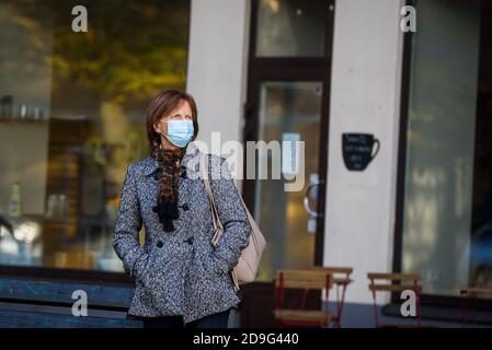 RIGA, LATVIA. 13th October 2020. Woman wearing face protective mask. Stock Photo