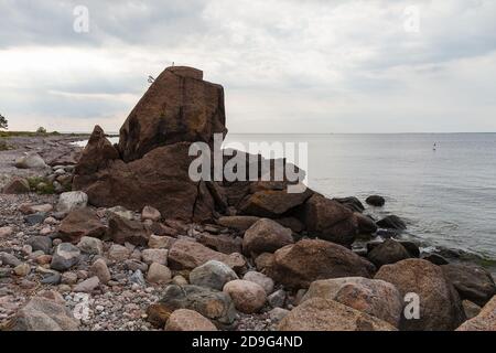 Boulders on the Baltic sea coast. Daytime. Stock Photo