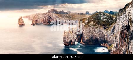 Scenic cliff landscape and sea in storm weather.cliffs of hell in Spain,Asturias.Beautiful and dreamlike rocks in the ocean.