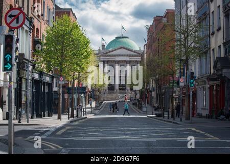 Parliament St. and Dublin Castle as seen from Grattan Bridge over the river Liffey  in Dublin, Ireland during the 2020 Lockdown during the Pandemic. Stock Photo