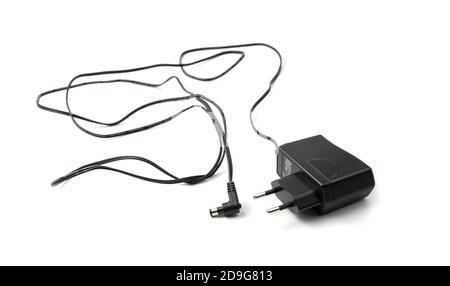 Charging device for equipment on a white background. Stock Photo