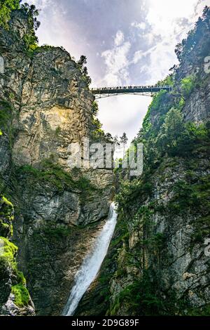 Germany - June 10, 2019, alpine panorama and the high bridge, Marienbrücke (Maria's Bridge) over the Pöllat gorge, near the Neuschwanstein Castle in F Stock Photo