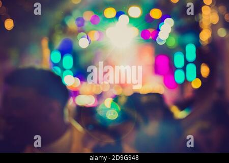 Party lights at night in the concert. Abstract colors circles background. Defocused picture. Stock Photo