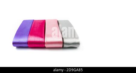 Four ribbons of different colors isolated on white. Stock Photo