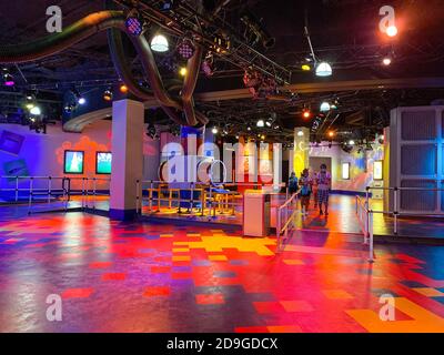 Orlando, FL/USA - 10/14/20:  People leaving  the Journey into Imagination ride at EPCOT at Disney World and walking through the closed games area. Stock Photo