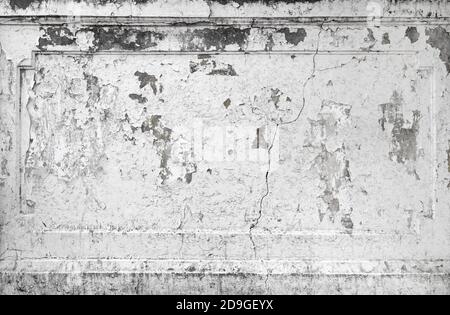 Cracked concrete plaster wall background. Distressed grungy texture Stock Photo