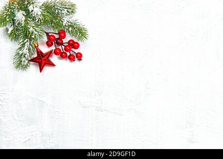 Christmas decoration and pine tree branches on bright background Stock Photo