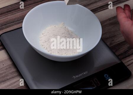 Weighing Flour For Baking With Professional Scales At The Manufacturing,  Close-up View Stock Photo, Picture and Royalty Free Image. Image 102690539.