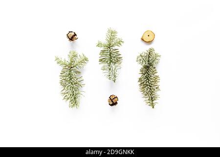 Christmas fir tree composition on white. Flat lay, top view. Handmade DIY concept. Winter flatlay holiday background Stock Photo