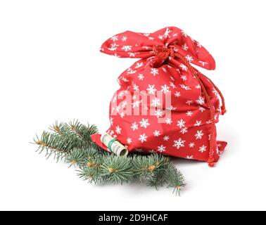 Santa Claus bag full of gifts on white background Stock Photo