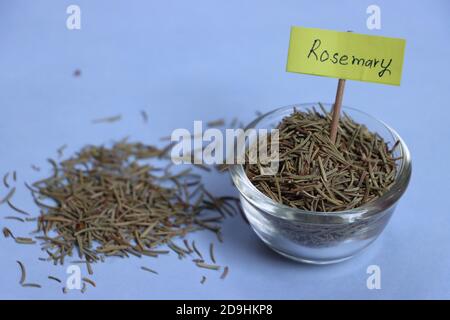 Dried Rosemary leaves, Salvia rosmarinus, used as seasoning or herb Stock Photo