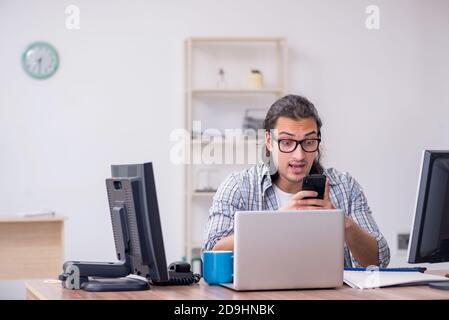 Male it specialist working in the office Stock Photo