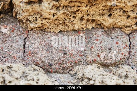 The texture of the stone with which the walls were lined Herod's Palace in the Caesarea Primorskaya National Park. Stock Photo
