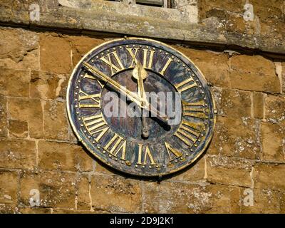 Church clock, St. Peter's Church in the village of Knossington, Leicestershire, England, UK Stock Photo