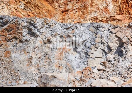 Opencast quarry. Diferent color stones. Geology mining industry. Nature resources Stock Photo